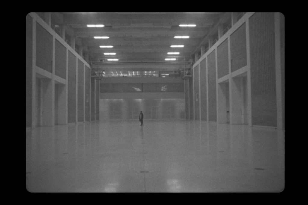 Guy in massive empty hall